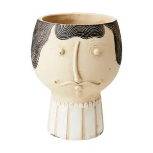 Cache-pot visage