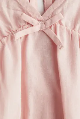 Blouse péplum en coton - Rose clair