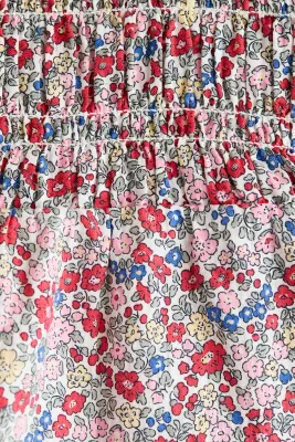 Combi-pantalon smockée en coton - Crème/rouge/fleuri