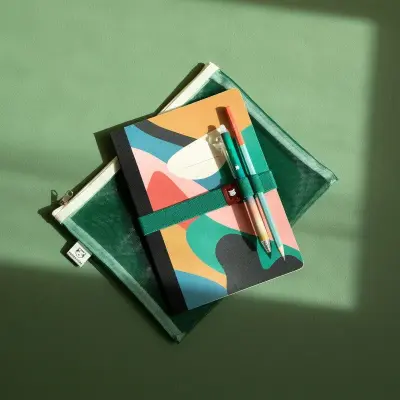 Élastiques et porte stylos (au choix)