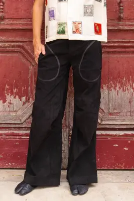 Pantalon velours à plis aux genoux
