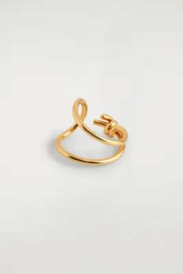 BAGUE À FINITION NOUÉE - DORÉ