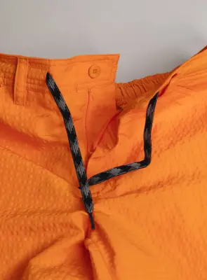 Running Shorts with Cargo Pocket in Orange Embossed Technical Fabric