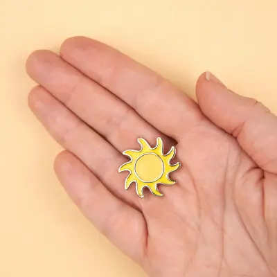 Pin's Soleil Coucou Suzette