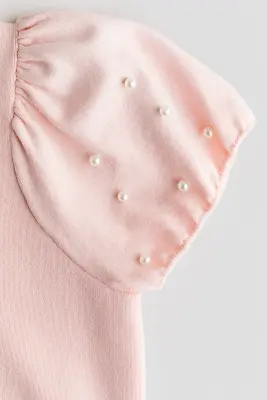 Top en maille fine avec perles fantaisie - Rose clair