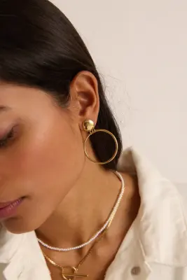 Boucles d'oreille Tila doré