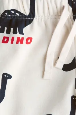 Pantalon jogger imprimé - Beige clair/dinosaures