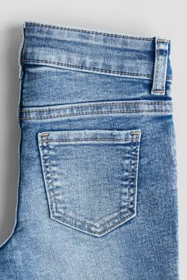 Embroidery-detail Flared Leg Jeans - Bleu denim/nœuds