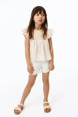 Short frangé en denim - Blanc