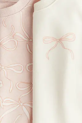 Lot de 2 sweats volantés - Rose clair/nœuds