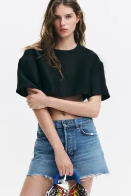 Short en denim avec bords à cru - Bleu denim clair