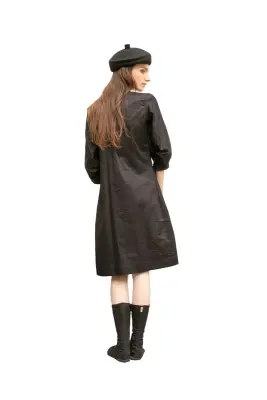 Robe tunique à plastron plissé