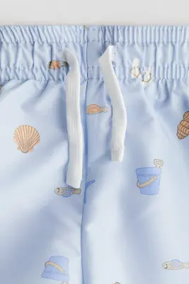 Short de bain à motif - Bleu clair/coquillages