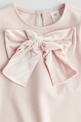 Robe en jersey avec nœud - Rose clair