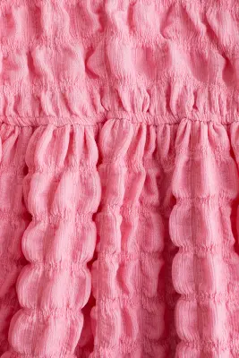 Robe en jersey texturé - Rose flamboyant
