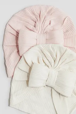Lot de 2 bonnets avec nœud - Rose clair/crème