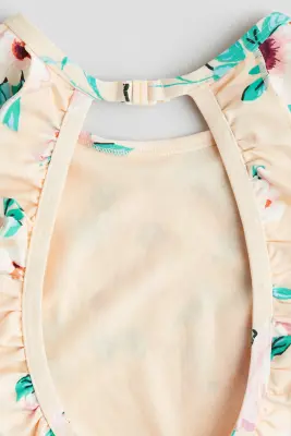 Maillot de bain avec ouverture - Pêche clair/fleuri