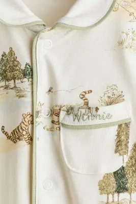 Printed cotton sleepsuit - Crème/Winnie l'ourson