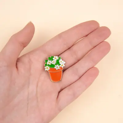 Pin's Pot de fleurs Coucou Suzette
