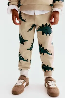 Pantalon jogger en molleton imprimé - Beige/dinosaures
