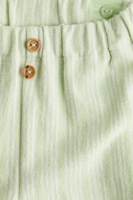 Pantalon en tissu éponge - Vert clair/rayures blanches